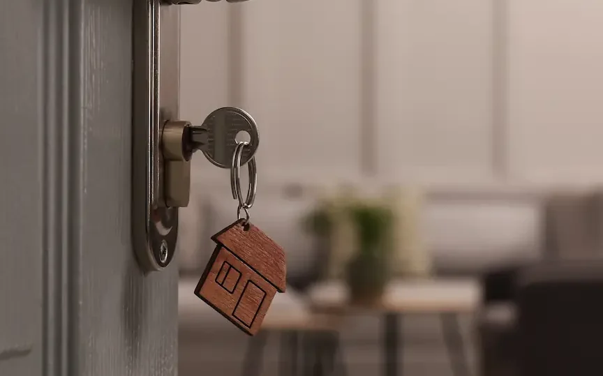 closeup-view-of-open-door-with-key-in-room-2026-01-28-16-58a-43-utc